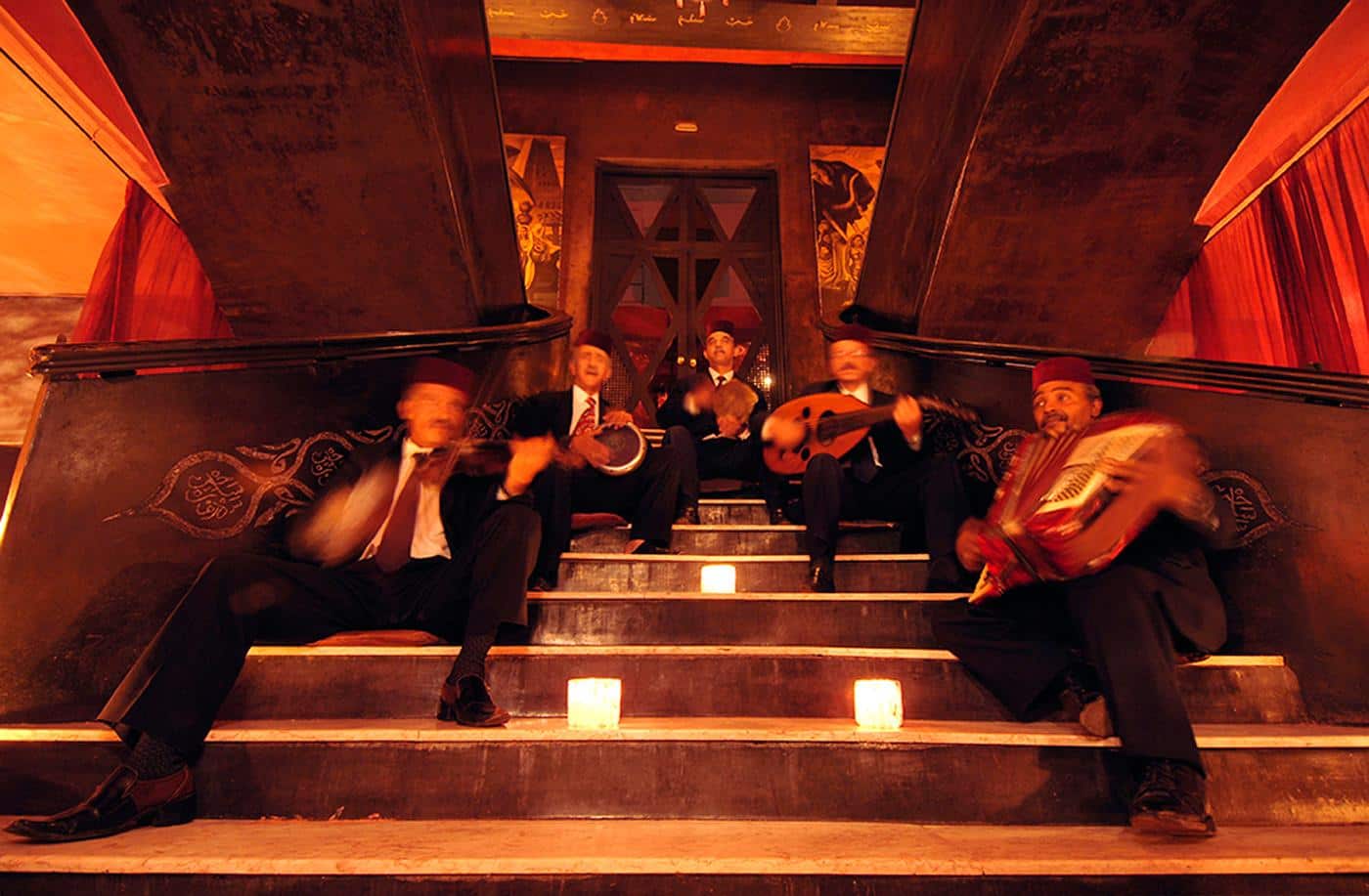  Decorated in over-the-top Berber glamour, the restaurant-cum-café really gets going after dinner when entertainers take the floor