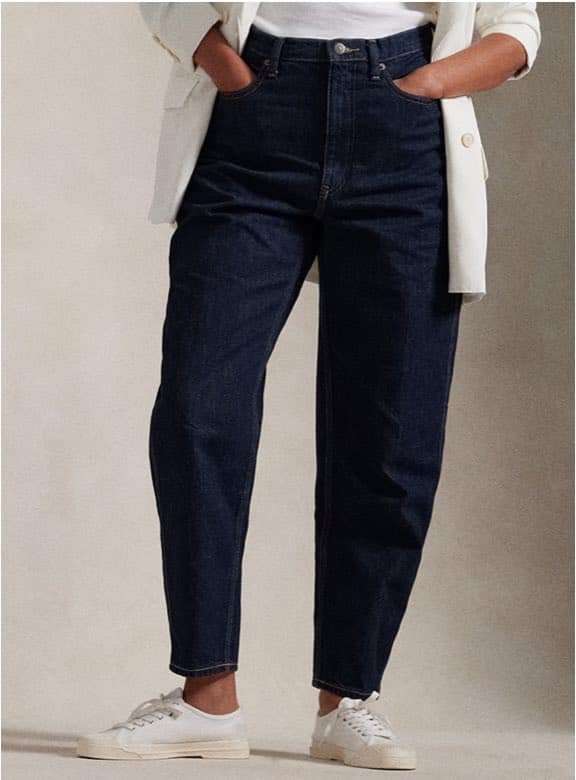 Photograph of woman in flared jeans.