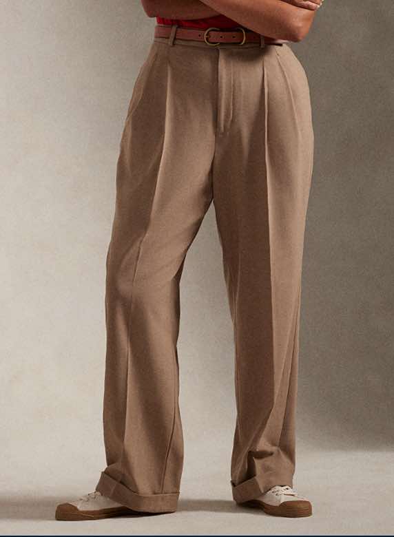 Photograph of woman in wide-leg chino pants.