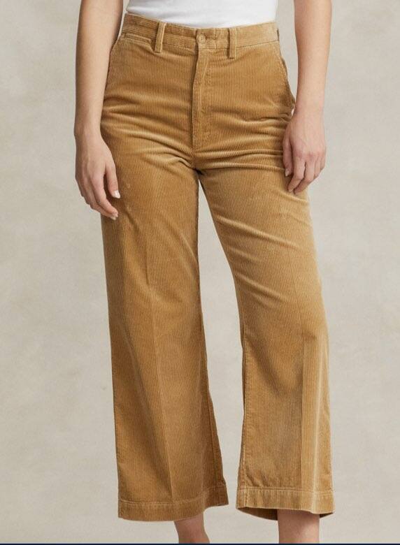 Photograph of woman in cropped wide-leg chino pants.